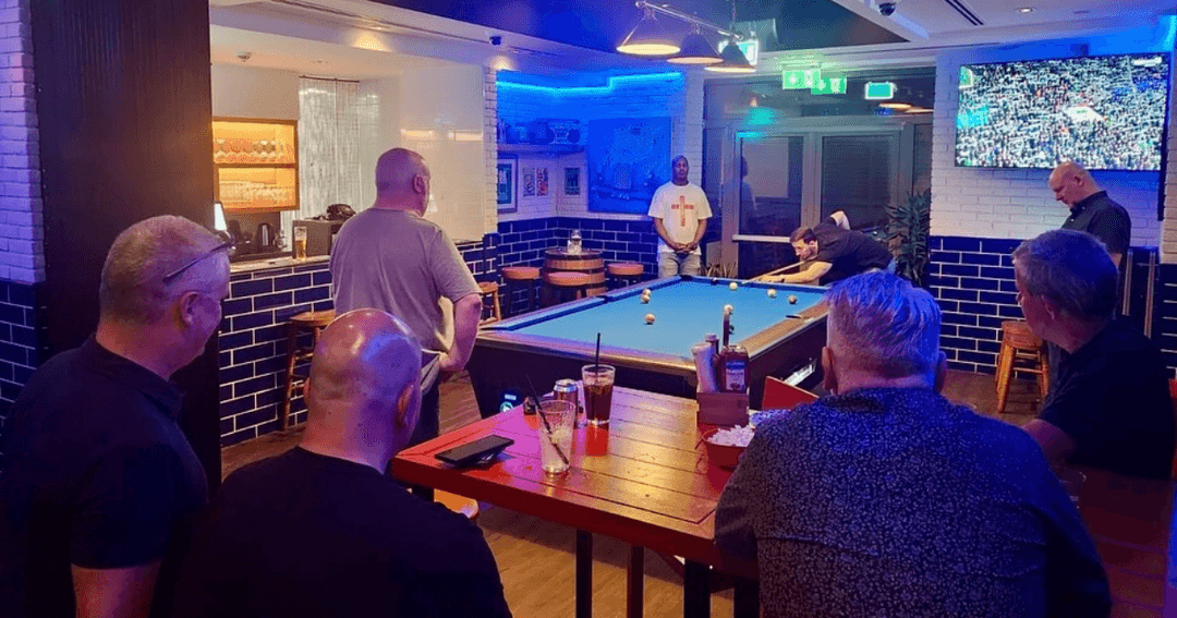 people playing pool at brighton rock