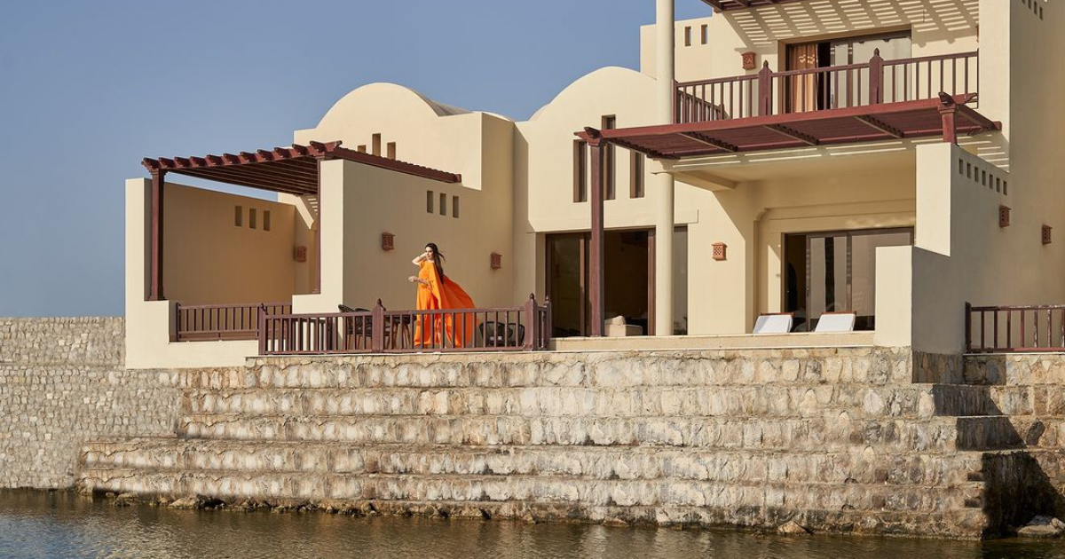 woman strolling through a resort