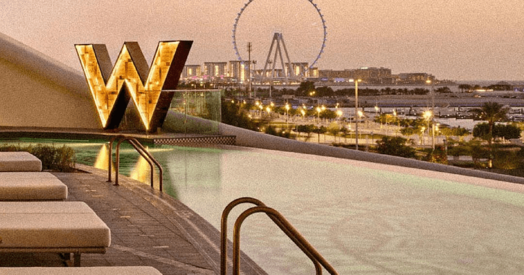 Pool area at Ginger Moon with view of Ain Dubai 