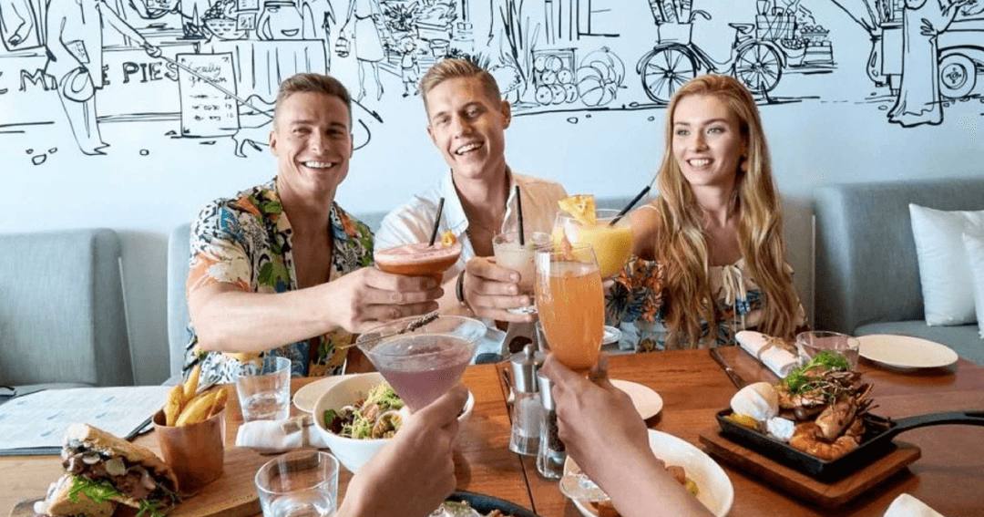 Group of friends toasting their drinks