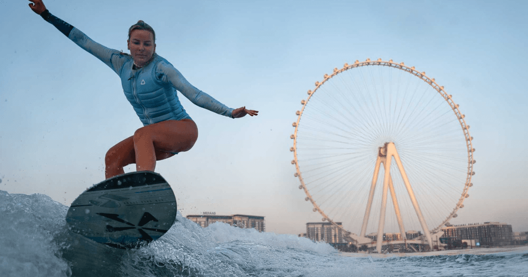 Lady Wakesurfing with the Ain Dubai in the background