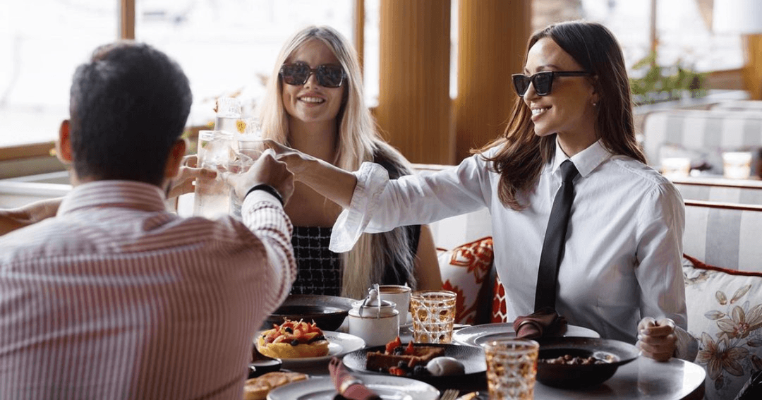 Three friends toasting