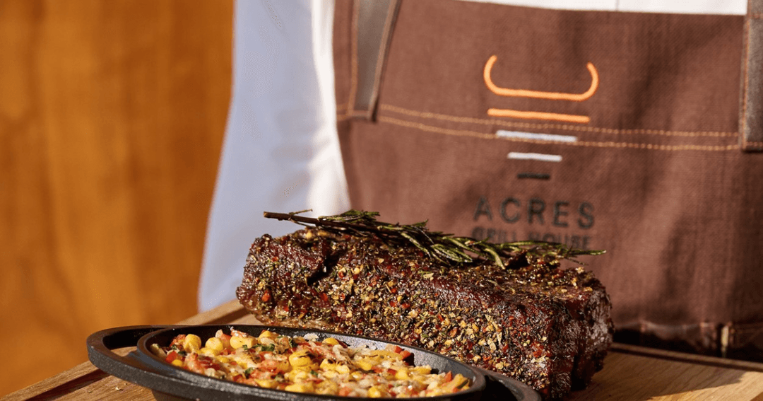 Steak and a side dish being served