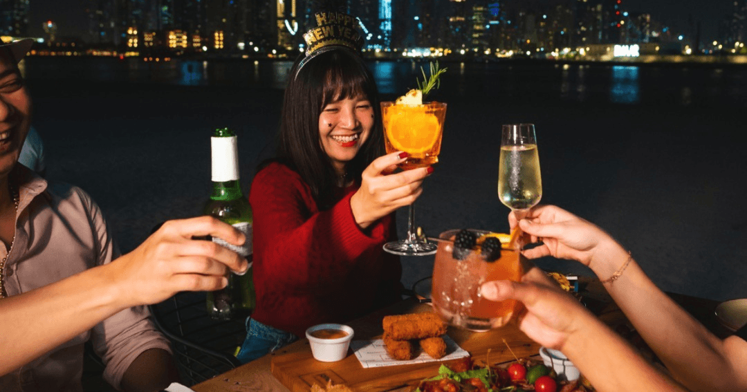 Guest toasting their glasses during New Year's Eve