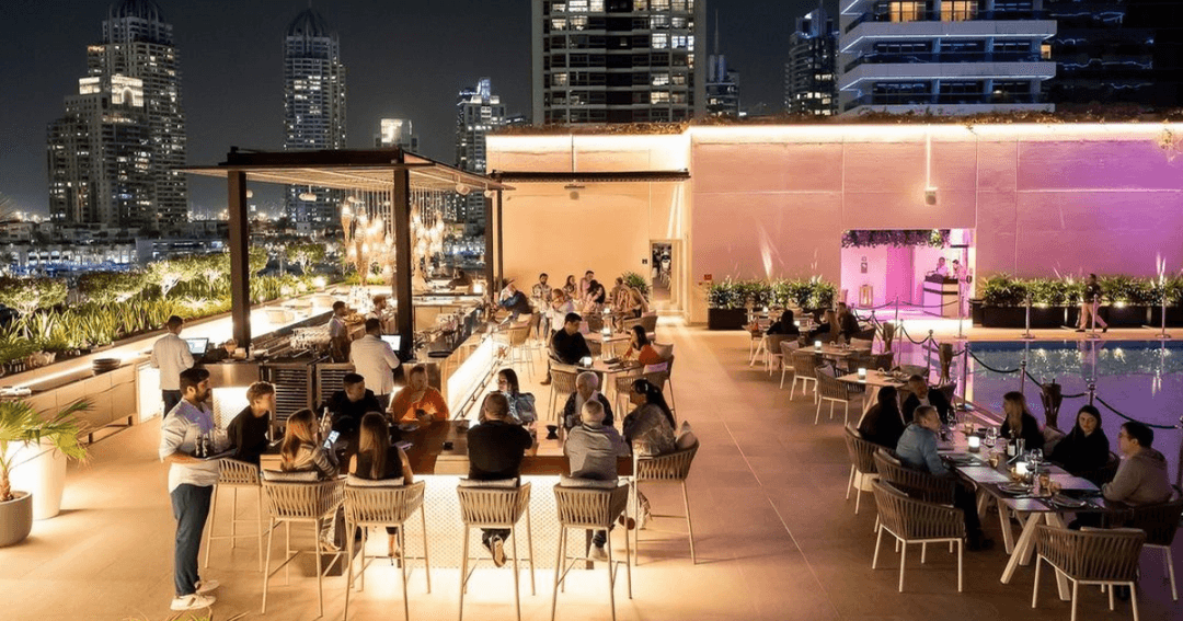 People sitting on the terrace of a bar