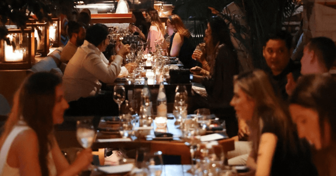 Guest dining and drinking at Above Eleven