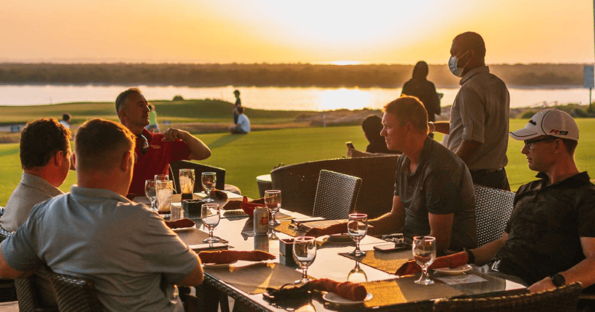 Outside seating area at Hickory's with view of a golf course