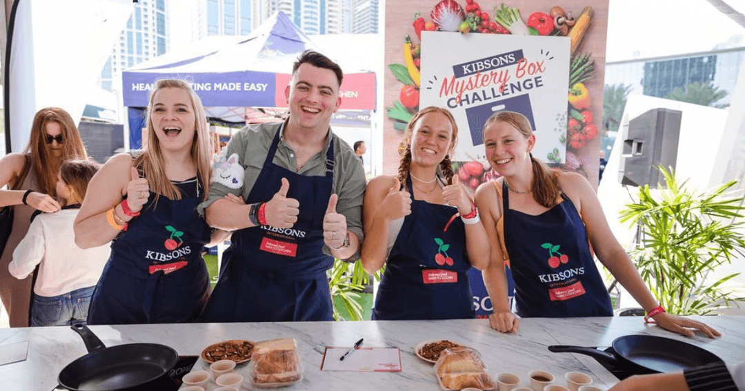 Four people on a cooking class 