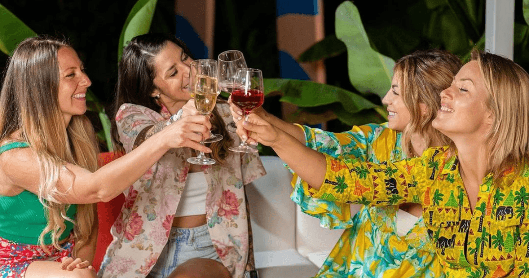 Group of women toasting their drinks