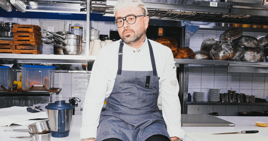 Chef Yevgeny Vikentev posing in the kitchen