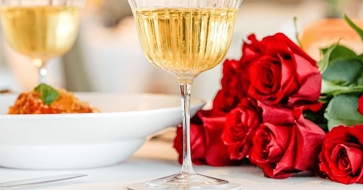 Champagne and roses on the table