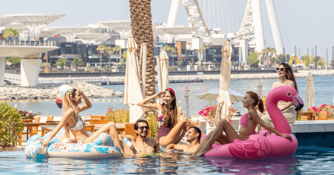 Guests enjoying the pool at Areia