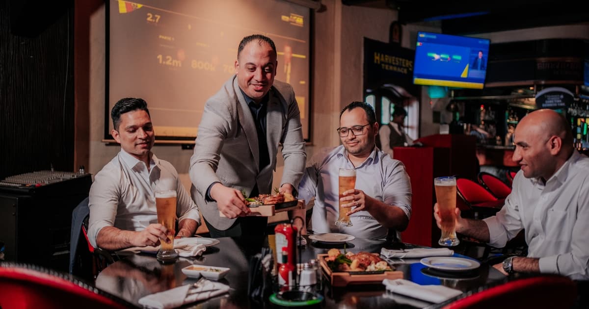 Guests being served food and drinks