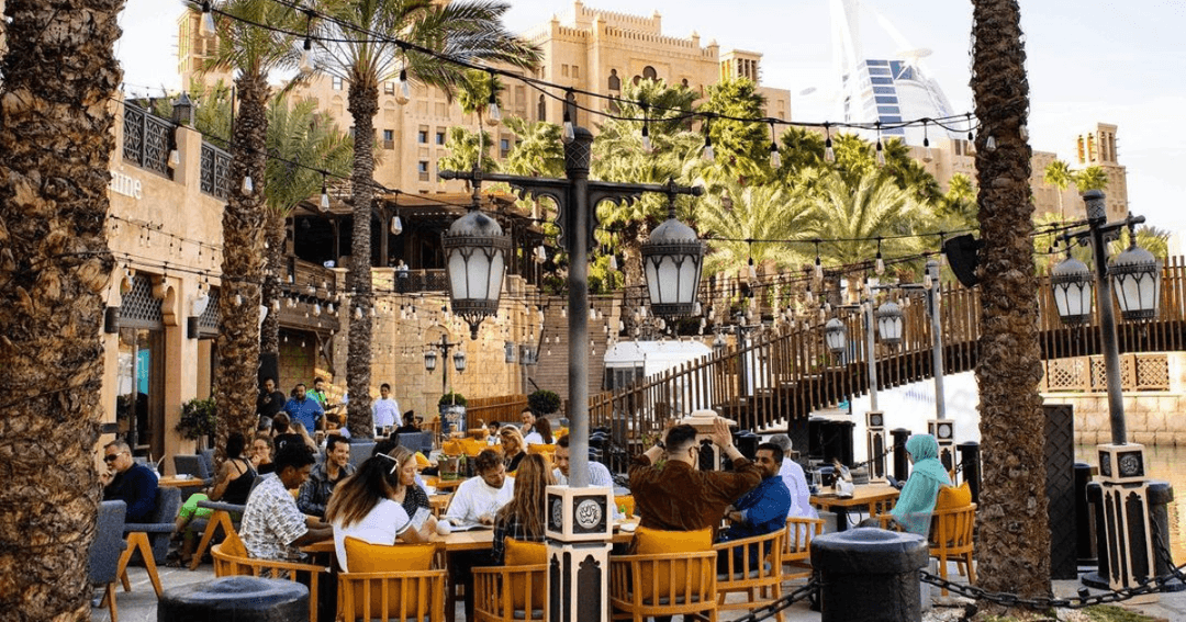 Guests in the outside dining area at Mezzanine