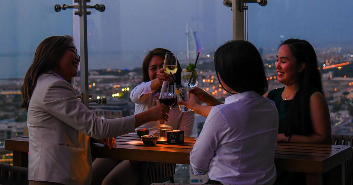 Group of women toasting their drinks