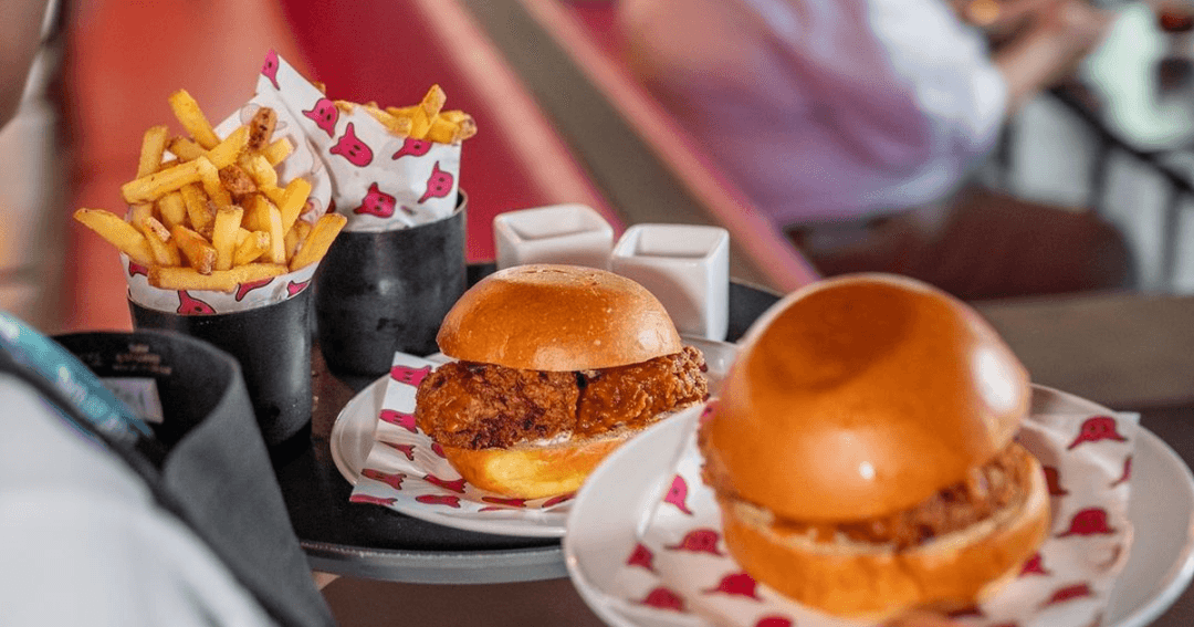 Burgers and fries being served