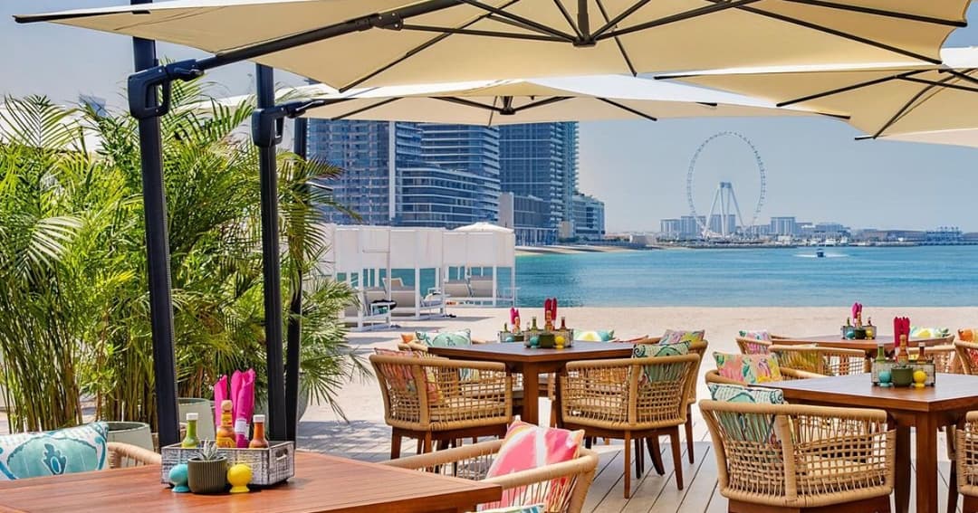 Outside seating at a beach restaurant