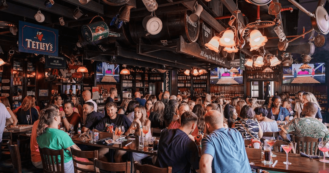 guests dining at a pub dubai