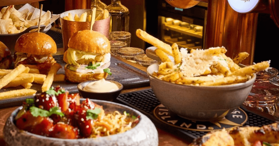 burger and fries served on a table