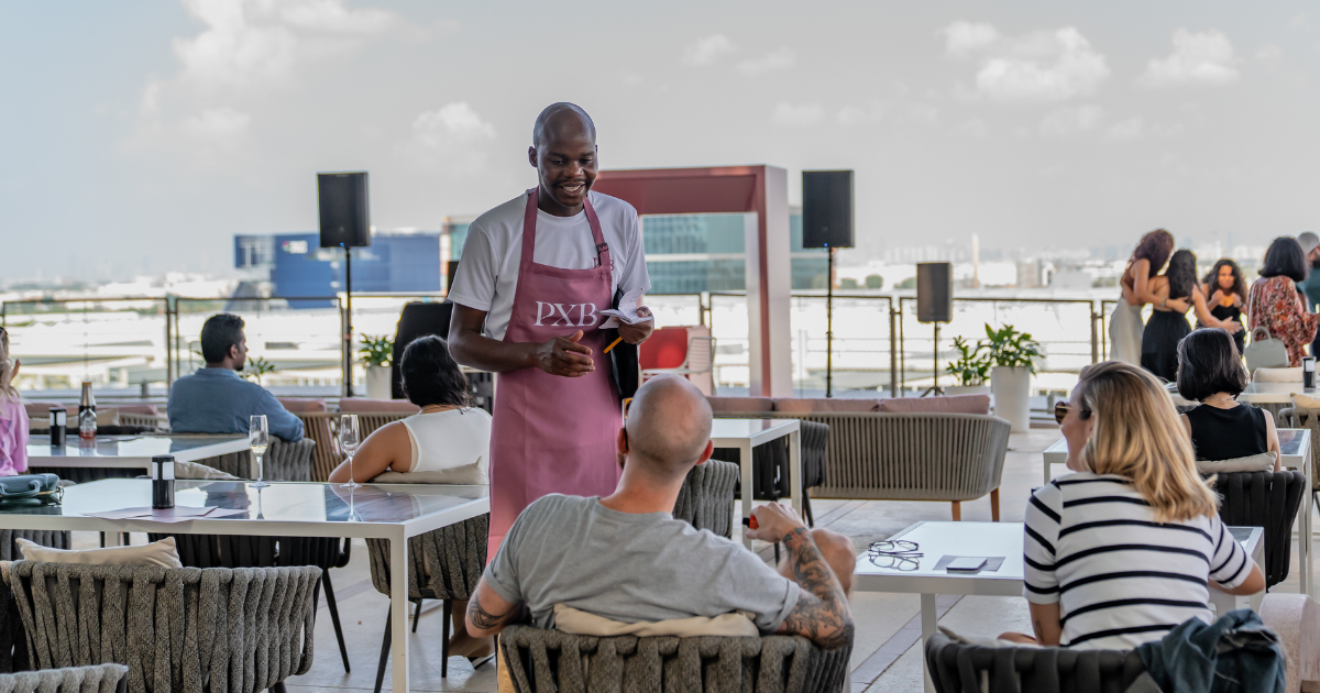 Waiter serving food