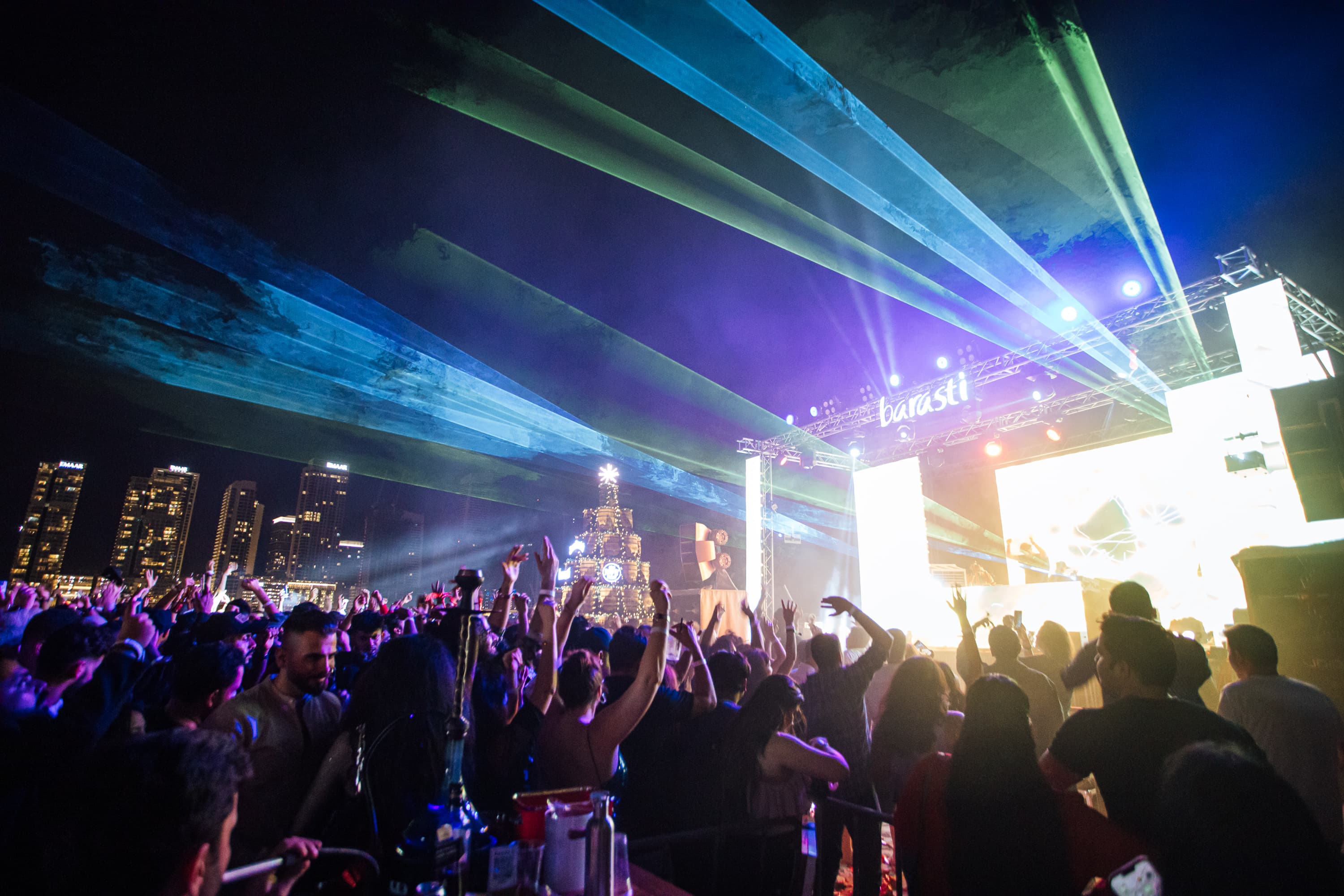 People dancing at an outdoor concert