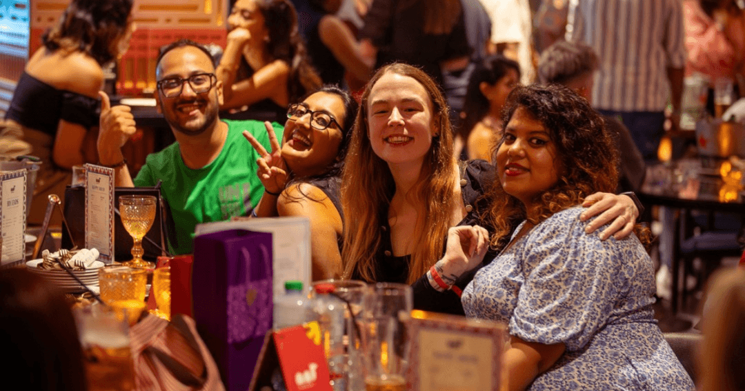 Friends enjoying a Christmas celebration at Cheeky Camel. 