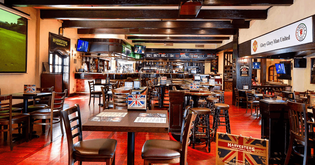 Spacious interior of Harvester's Dubai, perfect for watching the 2024 Euros with friends.