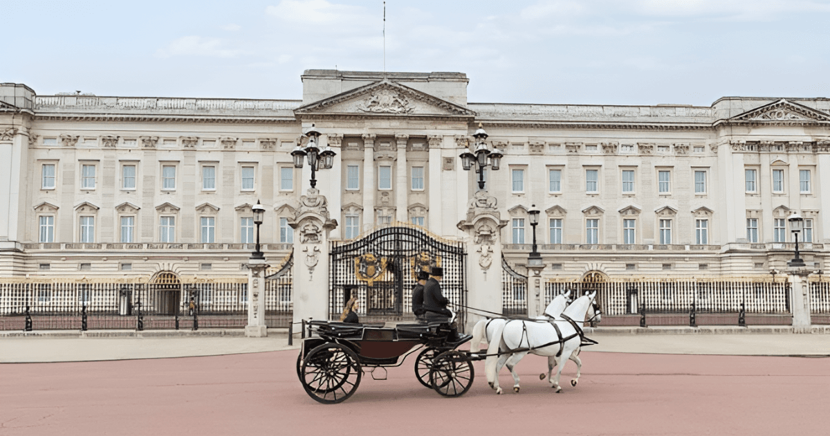 Horse-drawn carriage outside the historic facade of The Lanesborough London.