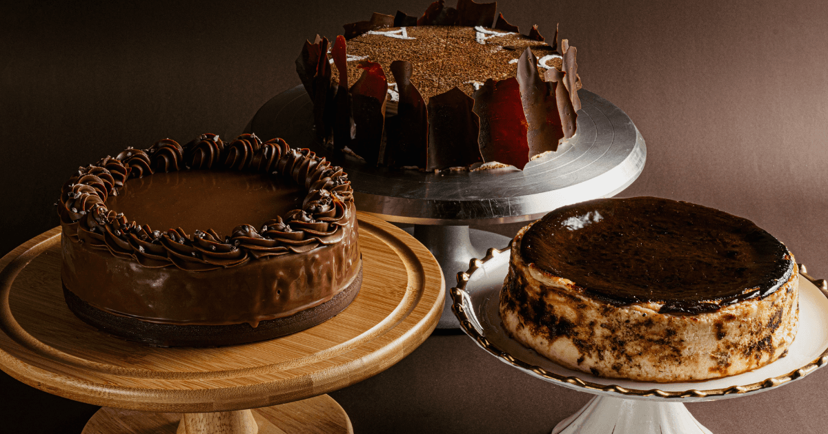 three cakes on display