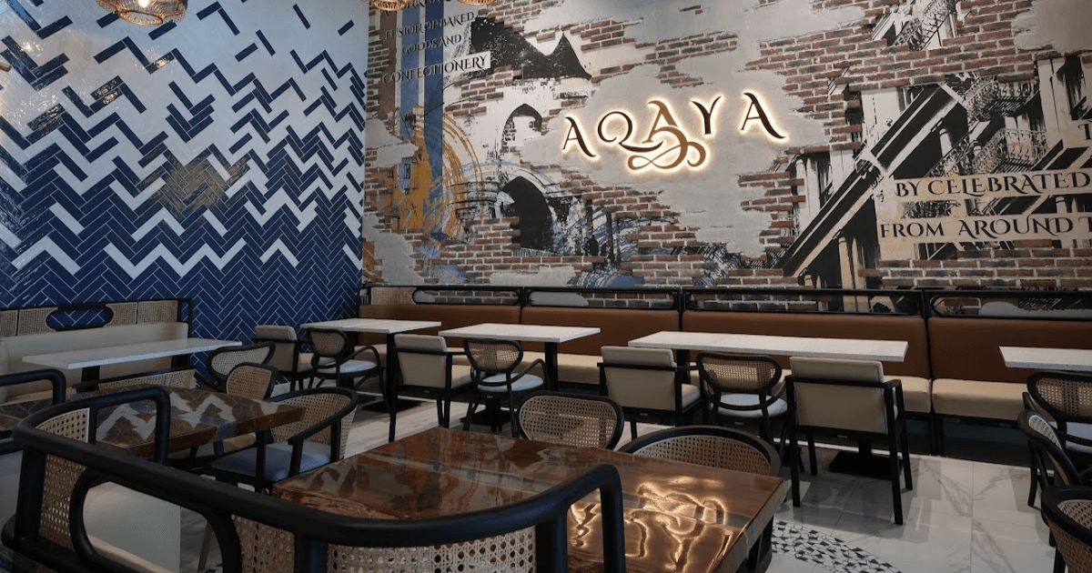 Modern and stylish interior of Aqaya in Dubai with a mix of blue and brick wall designs.