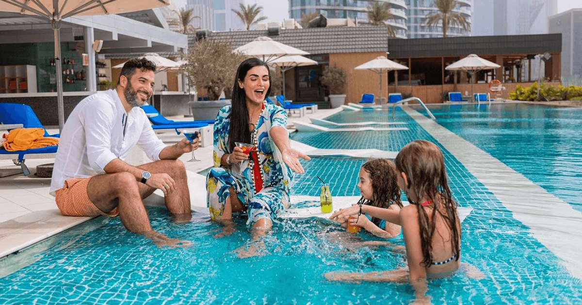 family enjoying at the pool